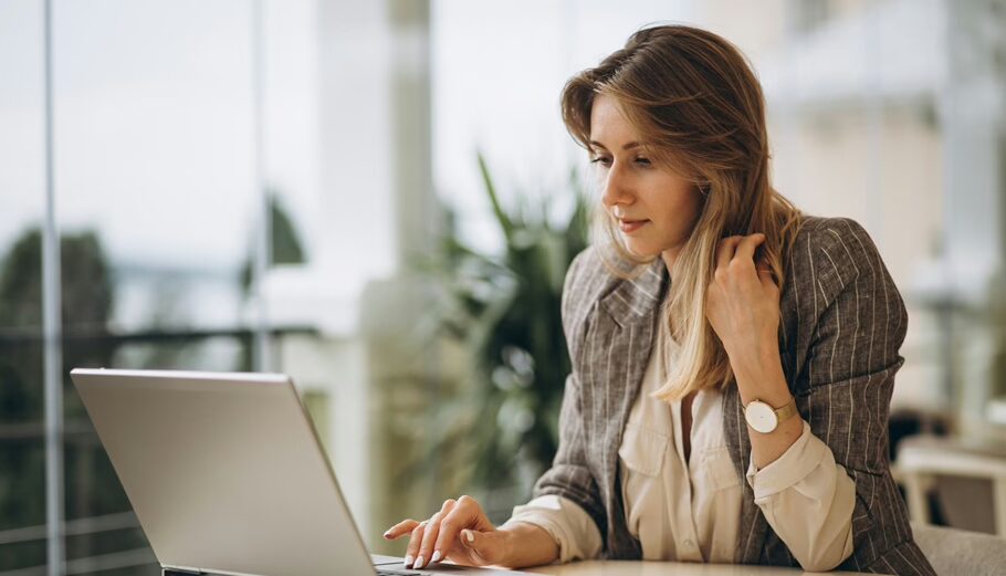Portrait of a business woman working on laptop
