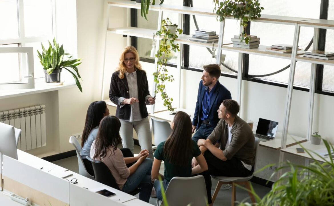 Middle-aged,60s,Female,Boss,Talk,With,Interns,Gives,Tasks,,Teaching