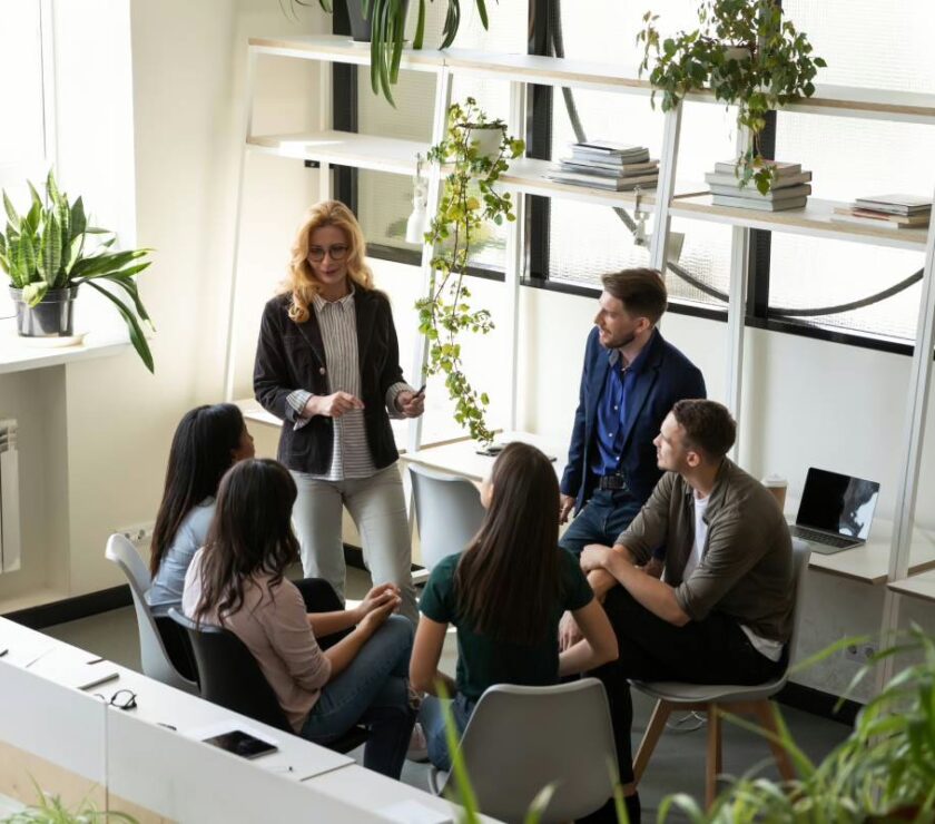 Middle-aged,60s,Female,Boss,Talk,With,Interns,Gives,Tasks,,Teaching